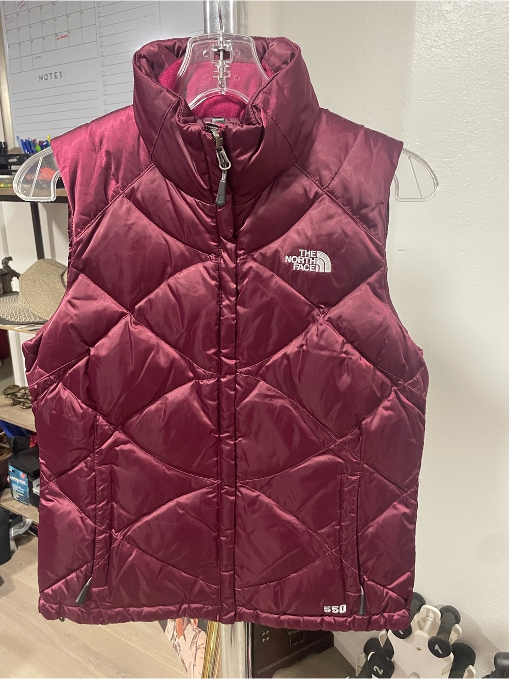 The North Face burgundy quilted 550 insulated women’s vest